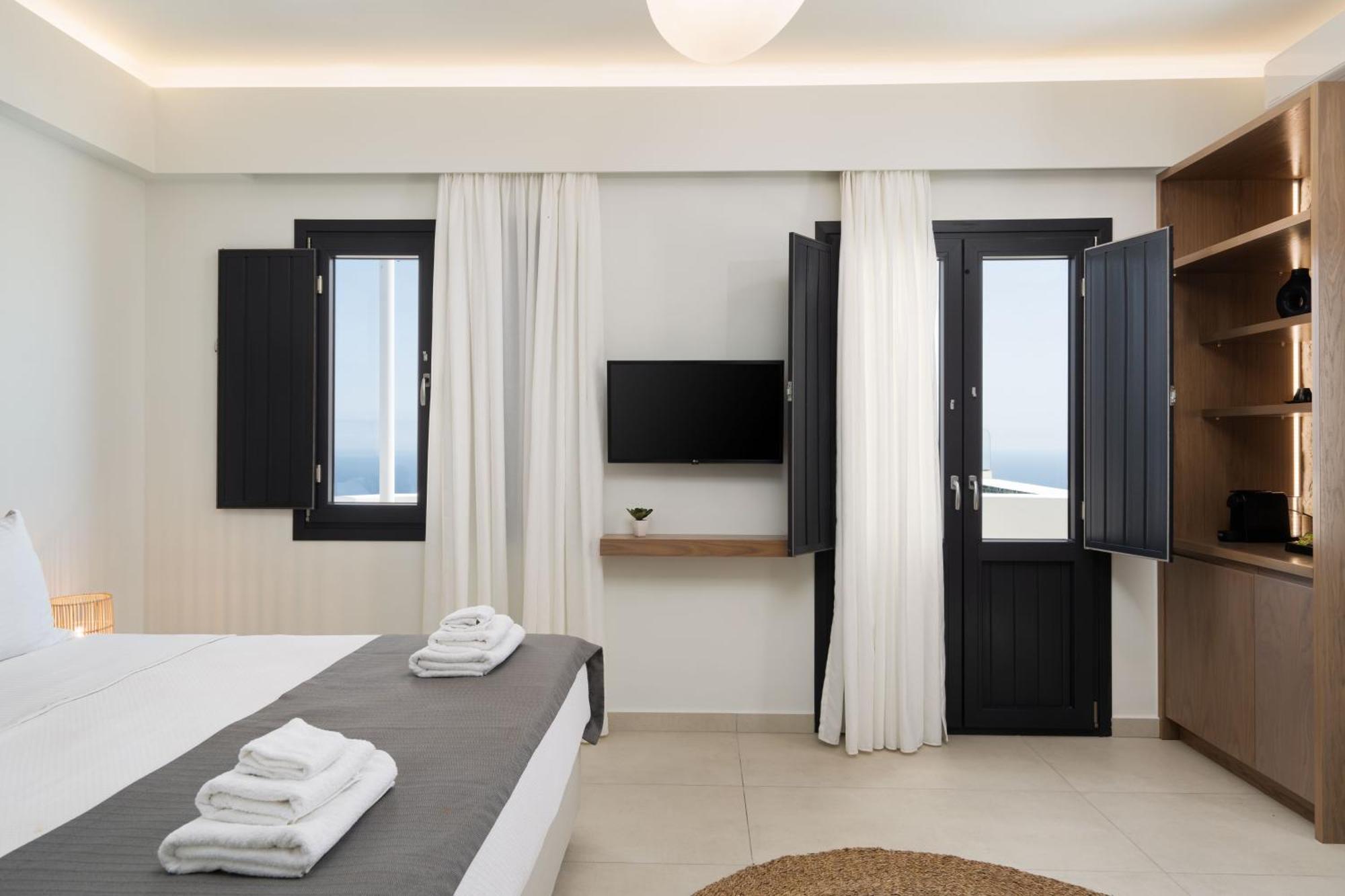 Cuore Santo Suites Тира Номер фото
