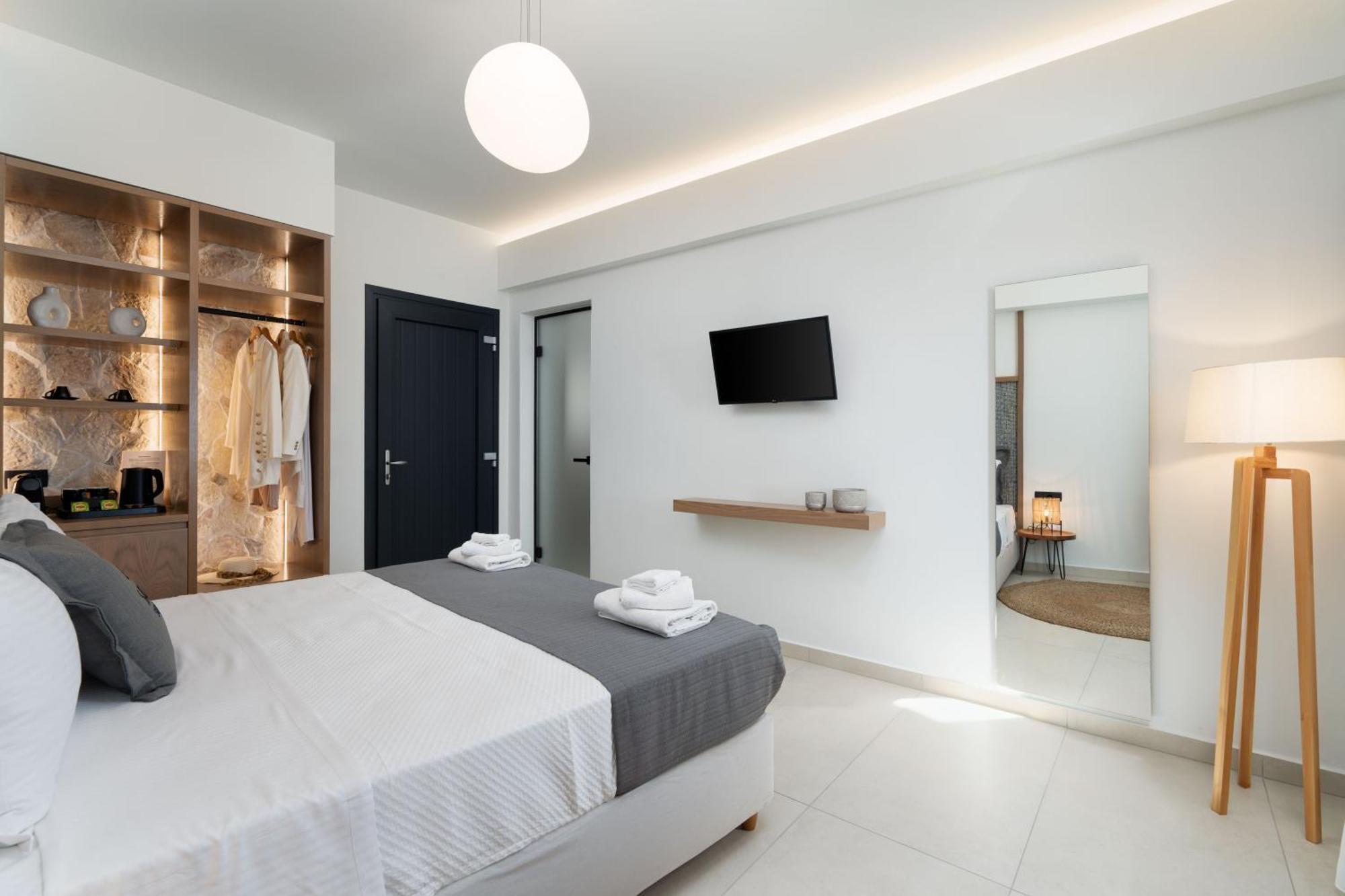 Cuore Santo Suites Тира Номер фото