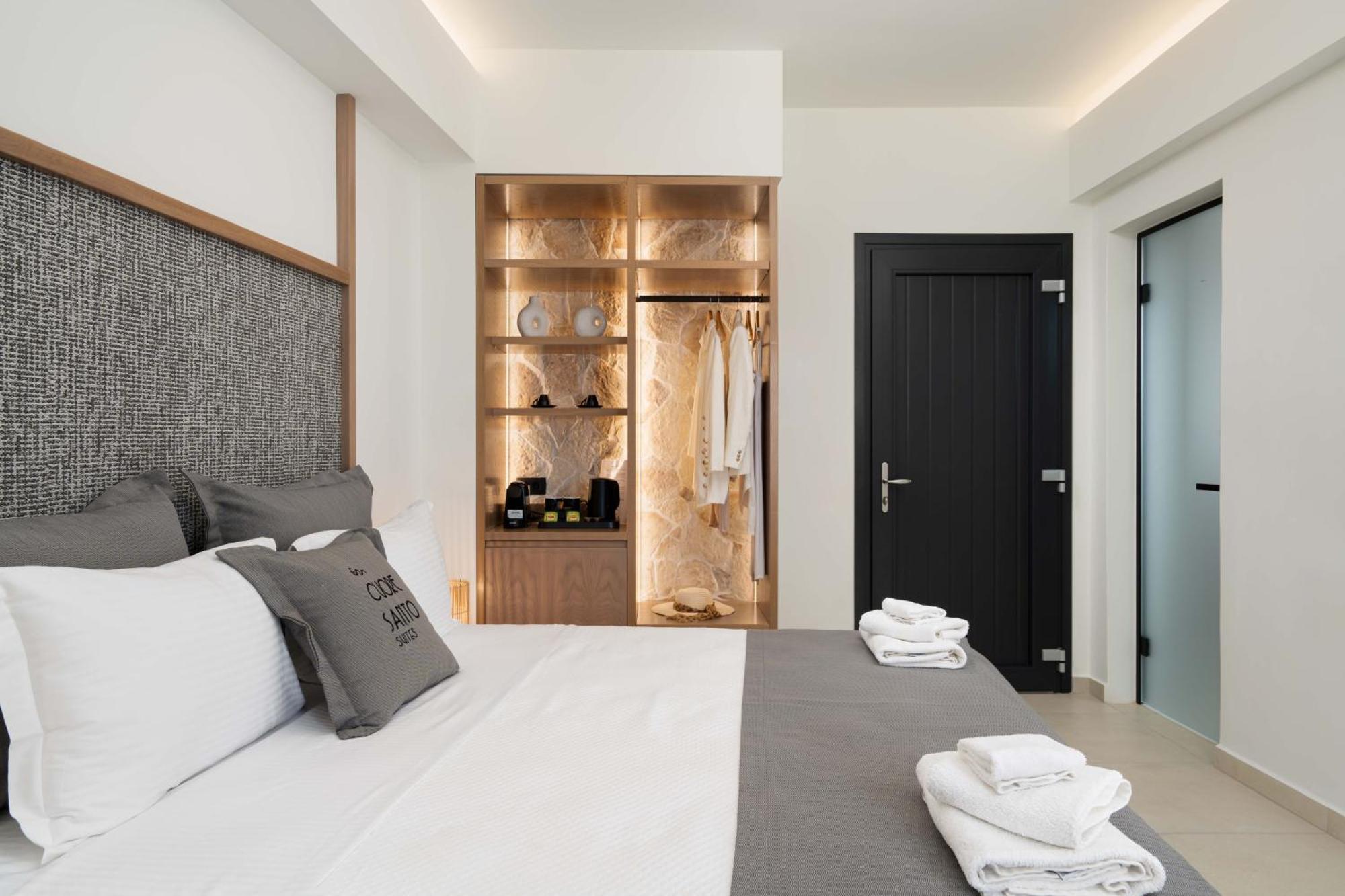 Cuore Santo Suites Тира Номер фото
