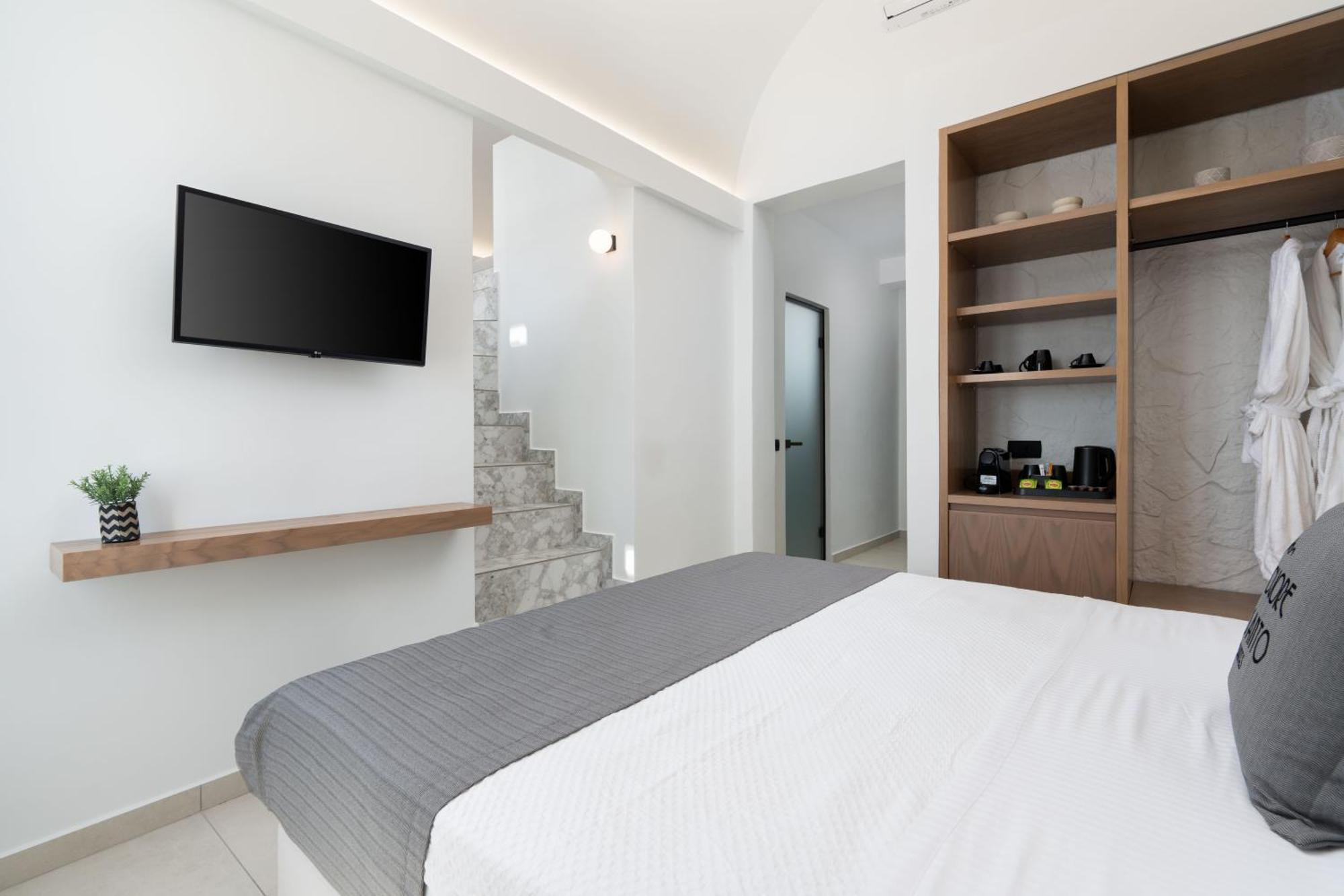 Cuore Santo Suites Тира Номер фото
